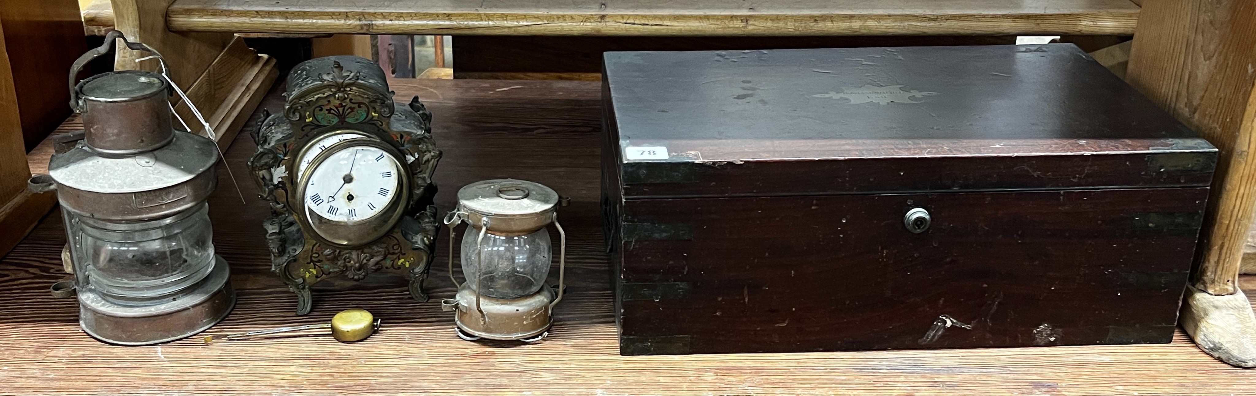 A 19th century mahogany cutlery box, width 46cm, two miniature ship's lanterns and a French inlaid mantel clock